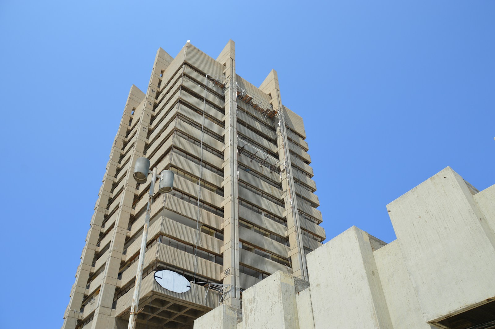 A tall building with a clock on the side of it